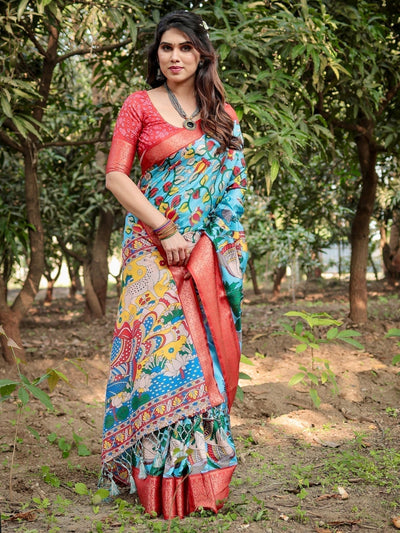 Aqua Blue Tussar Silk Saree with Vibrant Nature-Inspired Prints and Red Zari Border
