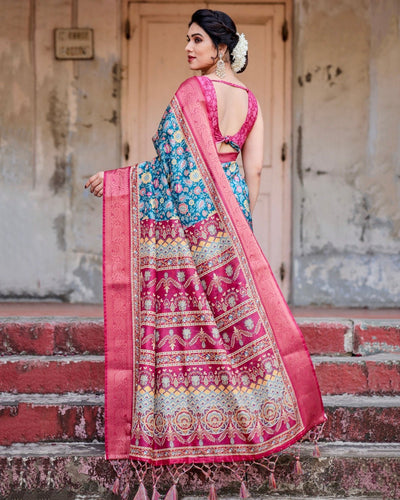 Teal Blue and Coral Tussar Silk Saree with Vibrant Floral Motifs and Ornamental Pallu