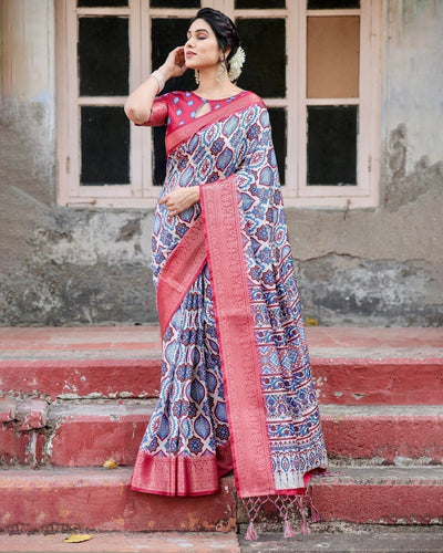 White and Red Tussar Silk Saree with Vibrant Floral Geometric Motifs and Ornamental Zari Border
