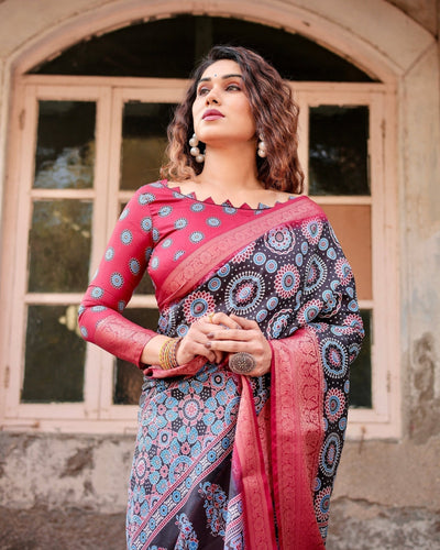 Black and Coral Tussar Silk Saree with Intricate Circular Motifs and Ornamental Pallu