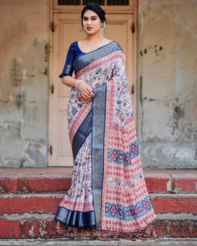 Ivory and Navy Blue Tussar Silk Saree with Floral Elegance and Ornamental Zari Work