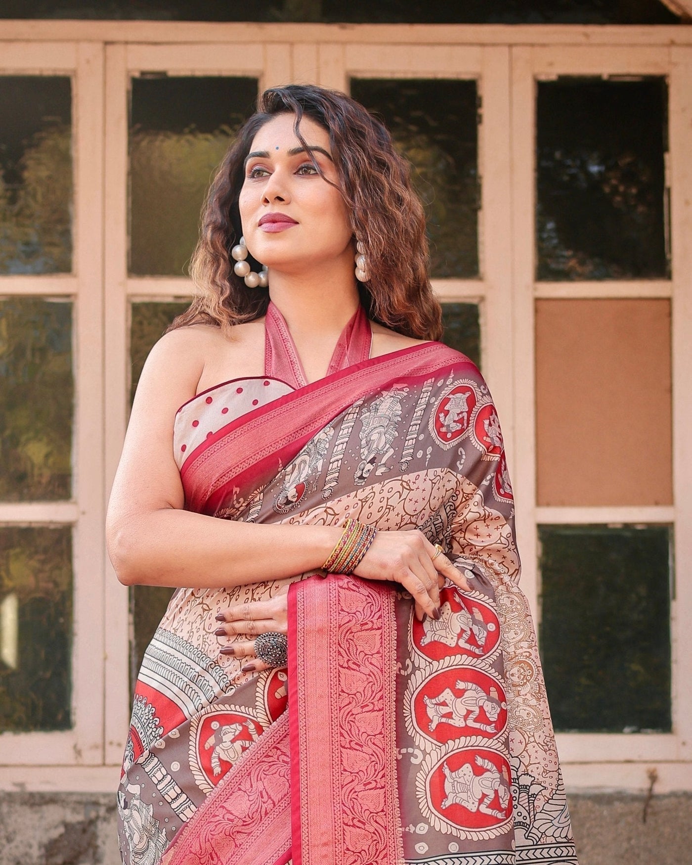 Beige and Red Tussar Silk Saree with Traditional Motifs and Ornamental Zari Border