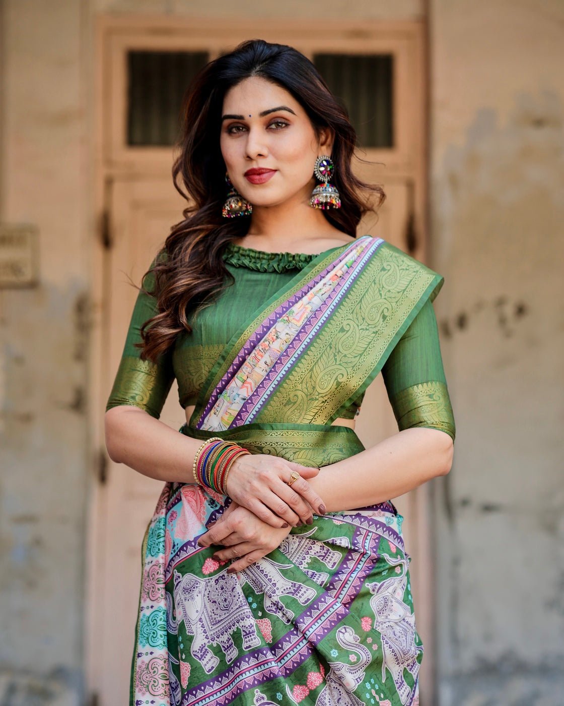 Ivory and Green Tussar Silk Saree with Elephant Motifs and Intricate Zari Border