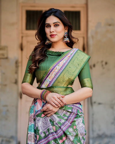 Ivory and Green Tussar Silk Saree with Elephant Motifs and Intricate Zari Border