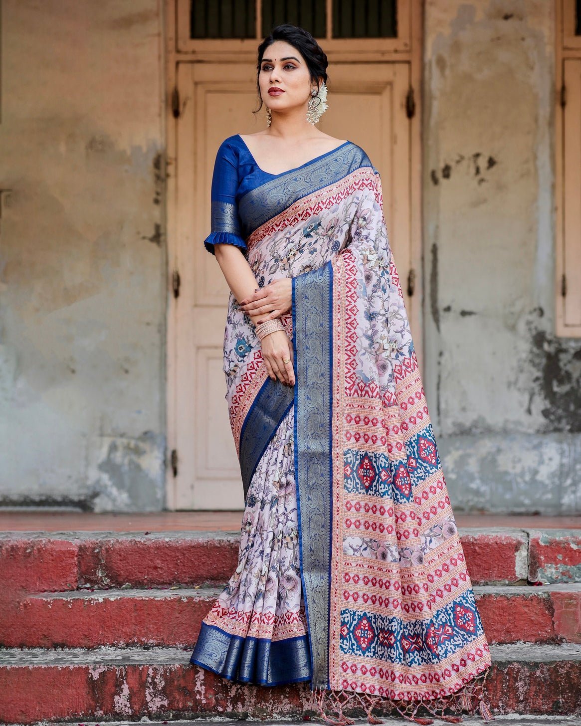 Ivory and Navy Blue Tussar Silk Saree with Floral Elegance and Ornamental Zari Work