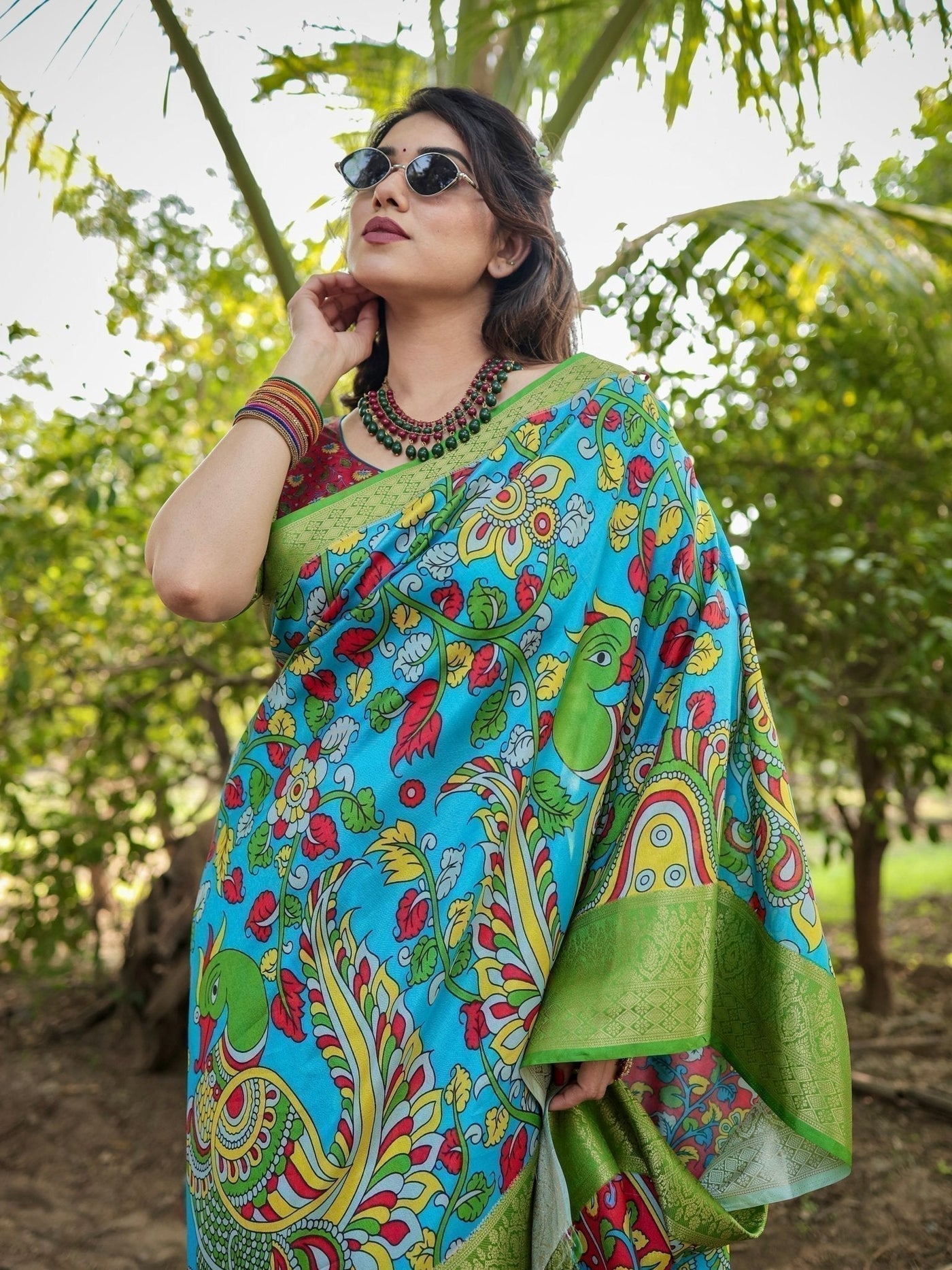 Vibrant Peacock Motif Blue and Green Tussar Silk Saree with Zari Border