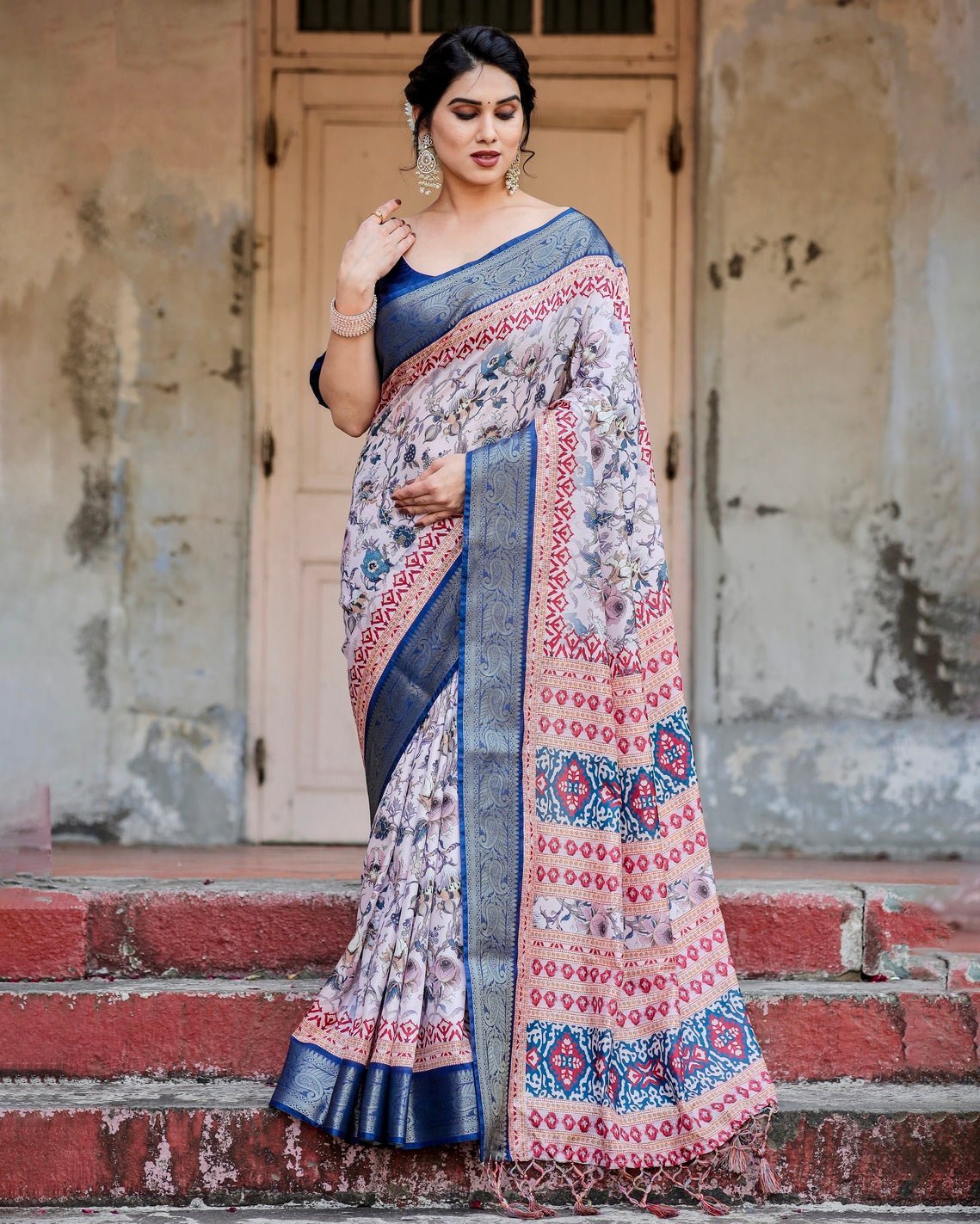 Ivory and Navy Blue Tussar Silk Saree with Floral Elegance and Ornamental Zari Work