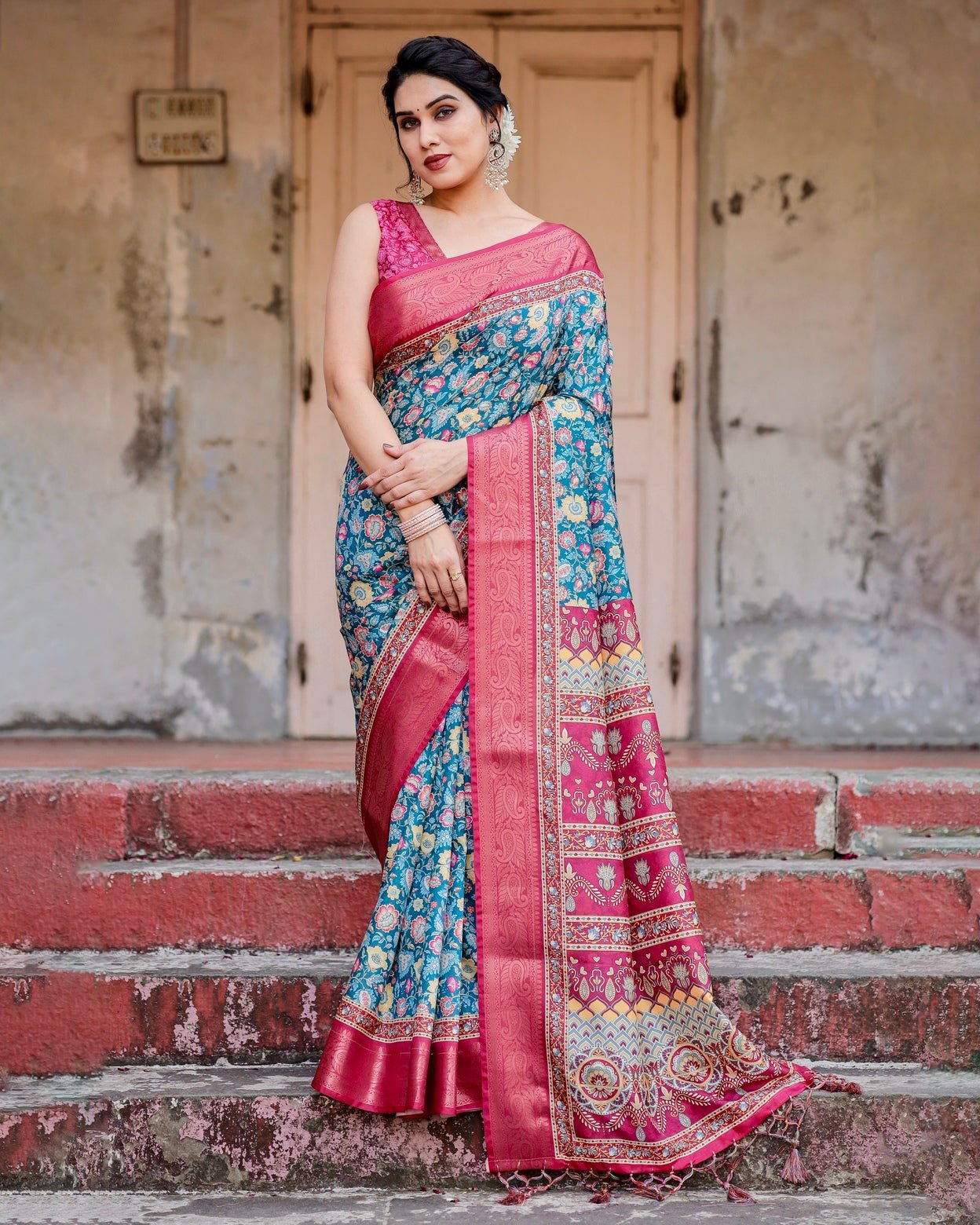 Teal Blue and Coral Tussar Silk Saree with Vibrant Floral Motifs and Ornamental Pallu