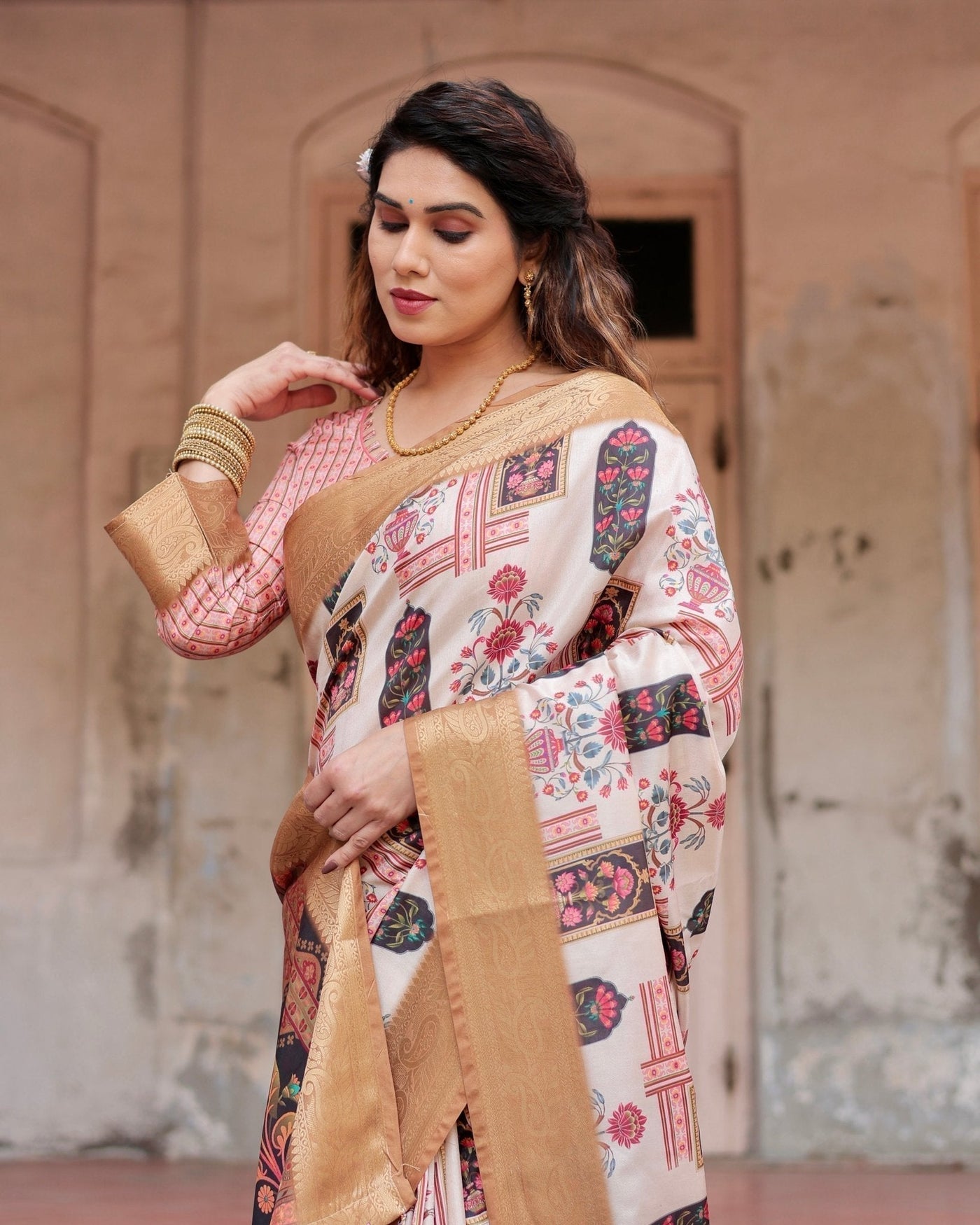 Ivory Tussar Silk Saree with Artistic Floral Motifs and Gleaming Golden Zari Border