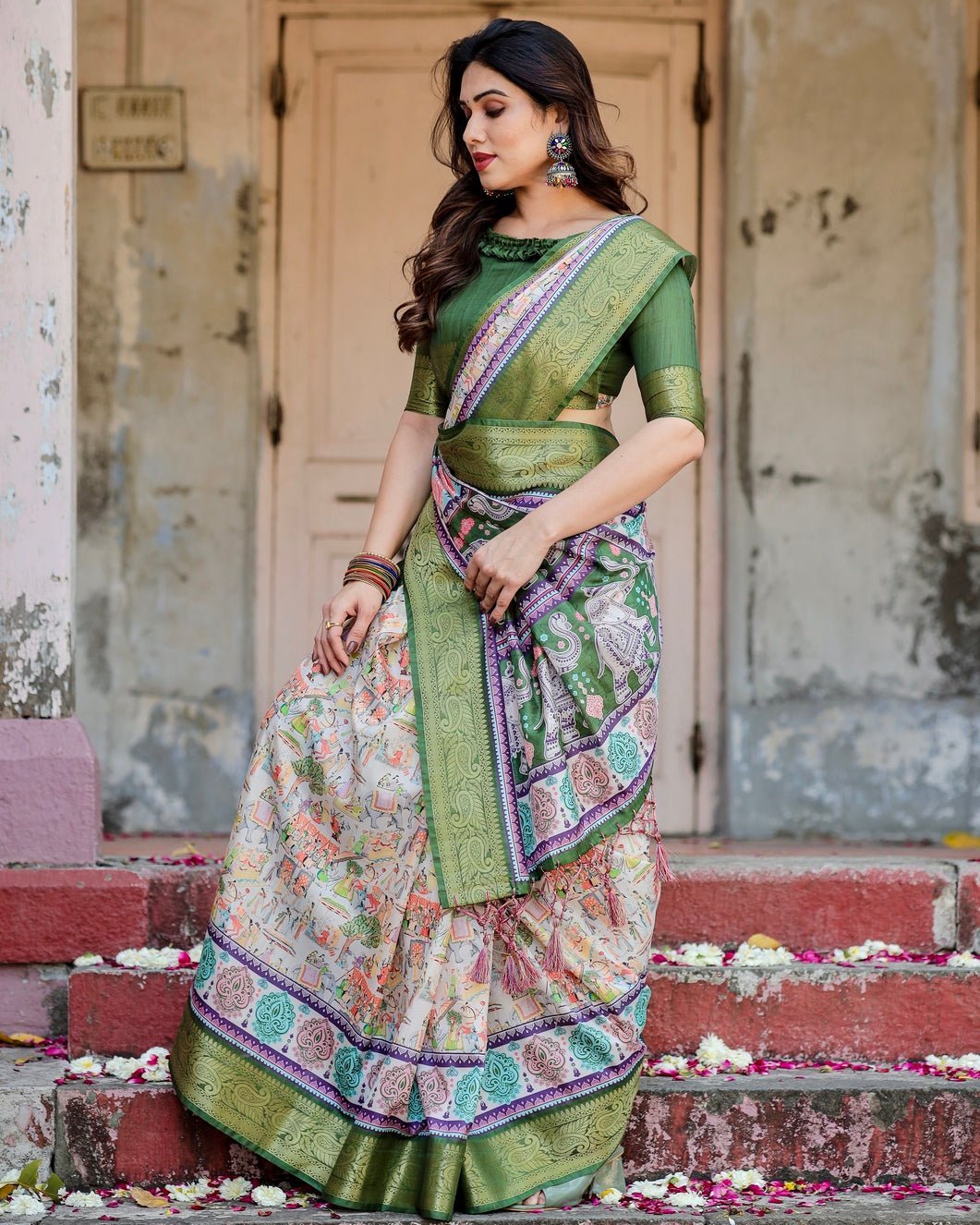 Ivory and Green Tussar Silk Saree with Elephant Motifs and Intricate Zari Border