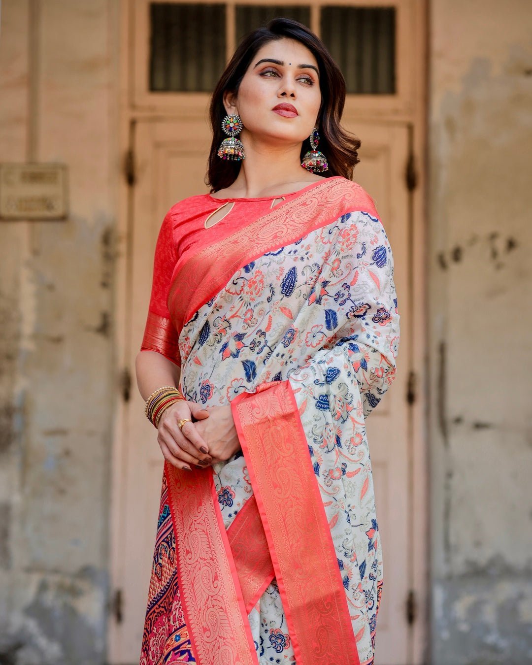 Ivory Tussar Silk Saree with Coral Zari Border and Intricate Floral Motifs