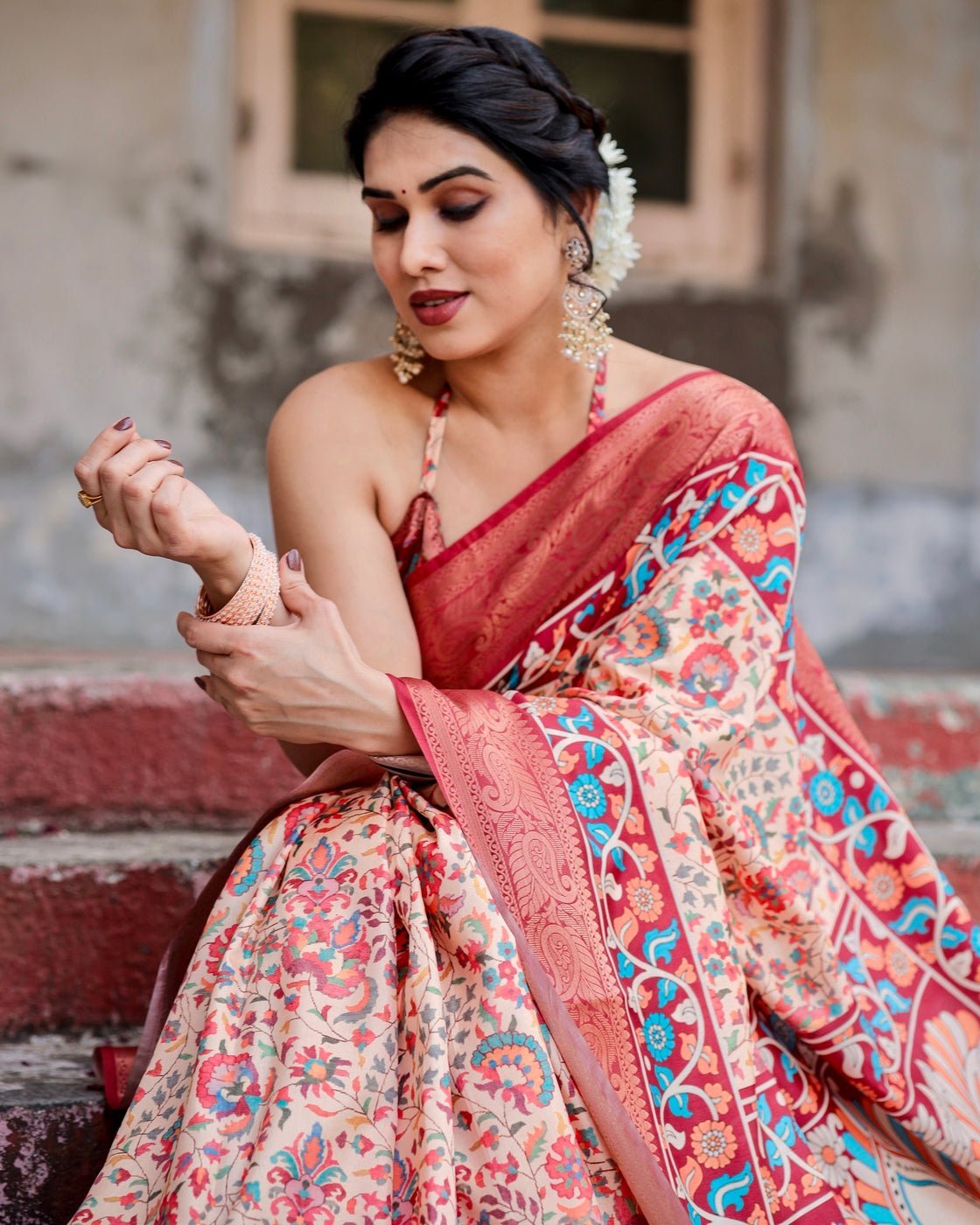 Beige and Coral Tussar Silk Saree with Intricate Floral Prints and Artistic Pallu