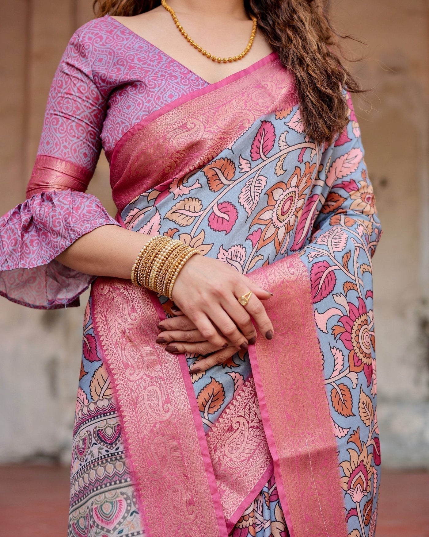 Graceful Grey Tussar Silk Saree with Pink Zari Border and Intricate Floral Motifs