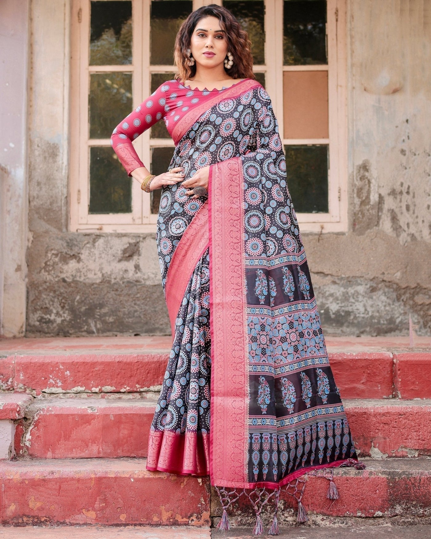 Black and Coral Tussar Silk Saree with Intricate Circular Motifs and Ornamental Pallu