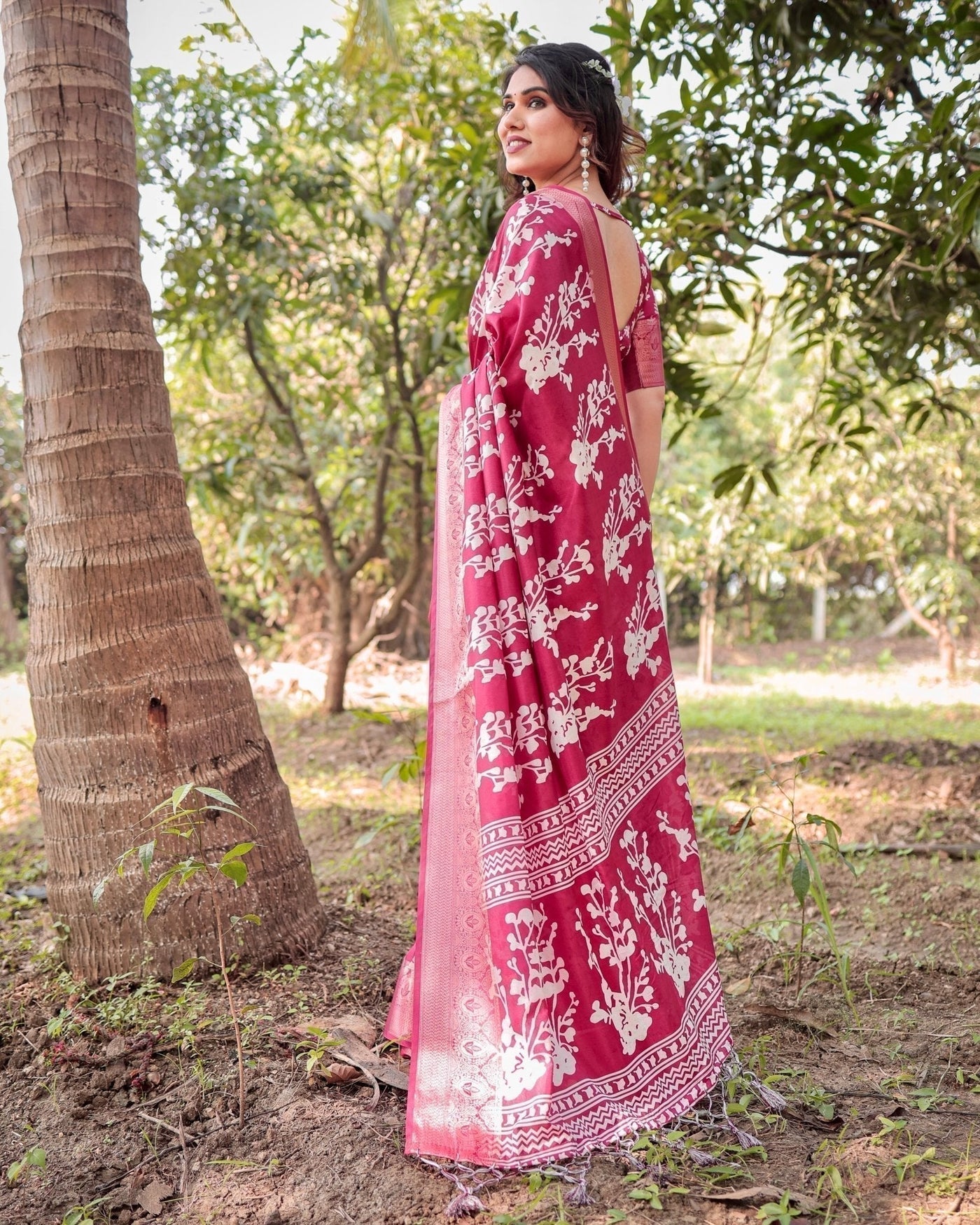 Maroon Tussar Silk Saree with White Floral Motifs, Intricate Zari Border, and Elegant Tassel Pallu