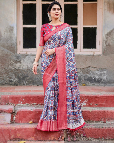 White and Red Tussar Silk Saree with Vibrant Floral Geometric Motifs and Ornamental Zari Border