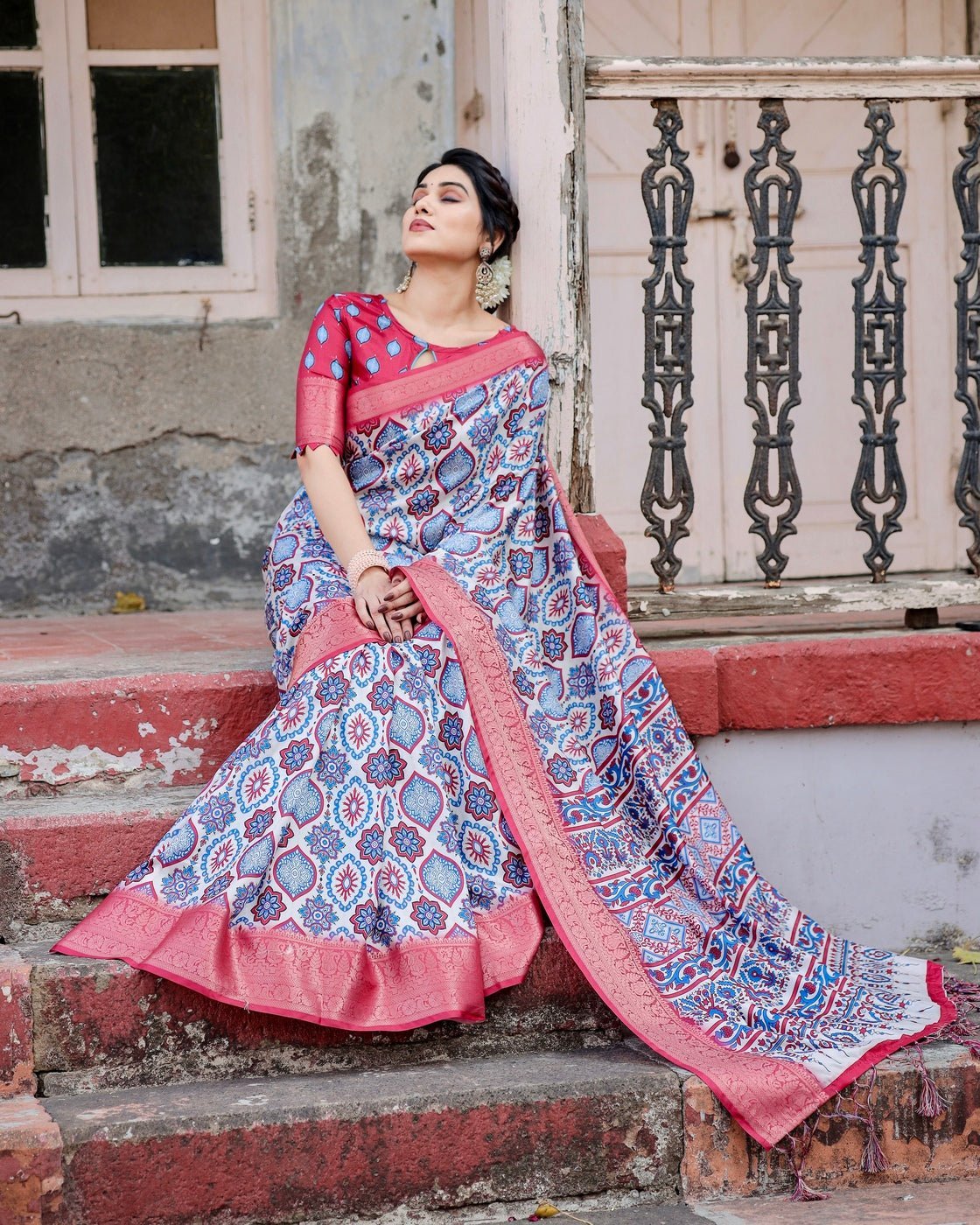 White and Red Tussar Silk Saree with Vibrant Floral Geometric Motifs and Ornamental Zari Border