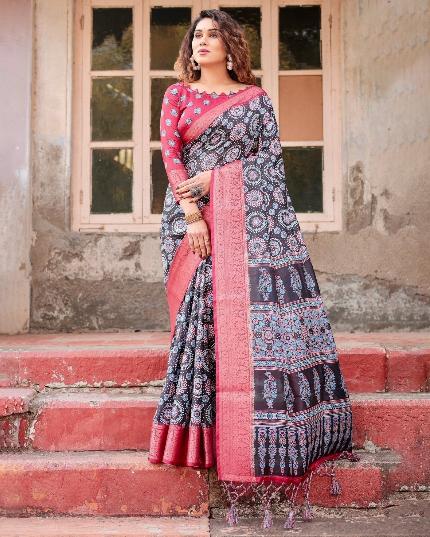 Black and Coral Tussar Silk Saree with Intricate Circular Motifs and Ornamental Pallu
