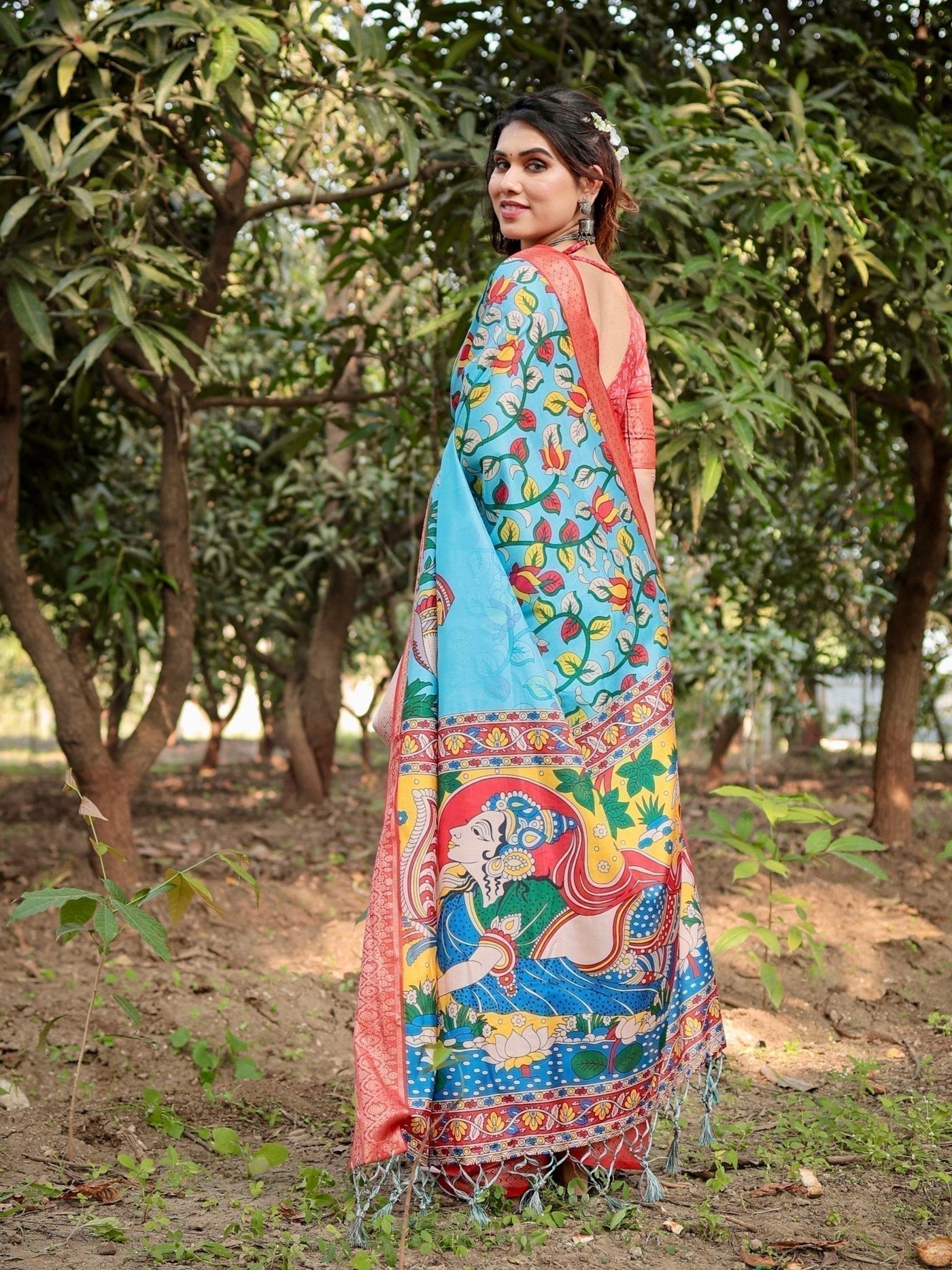Aqua Blue Tussar Silk Saree with Vibrant Nature-Inspired Prints and Red Zari Border
