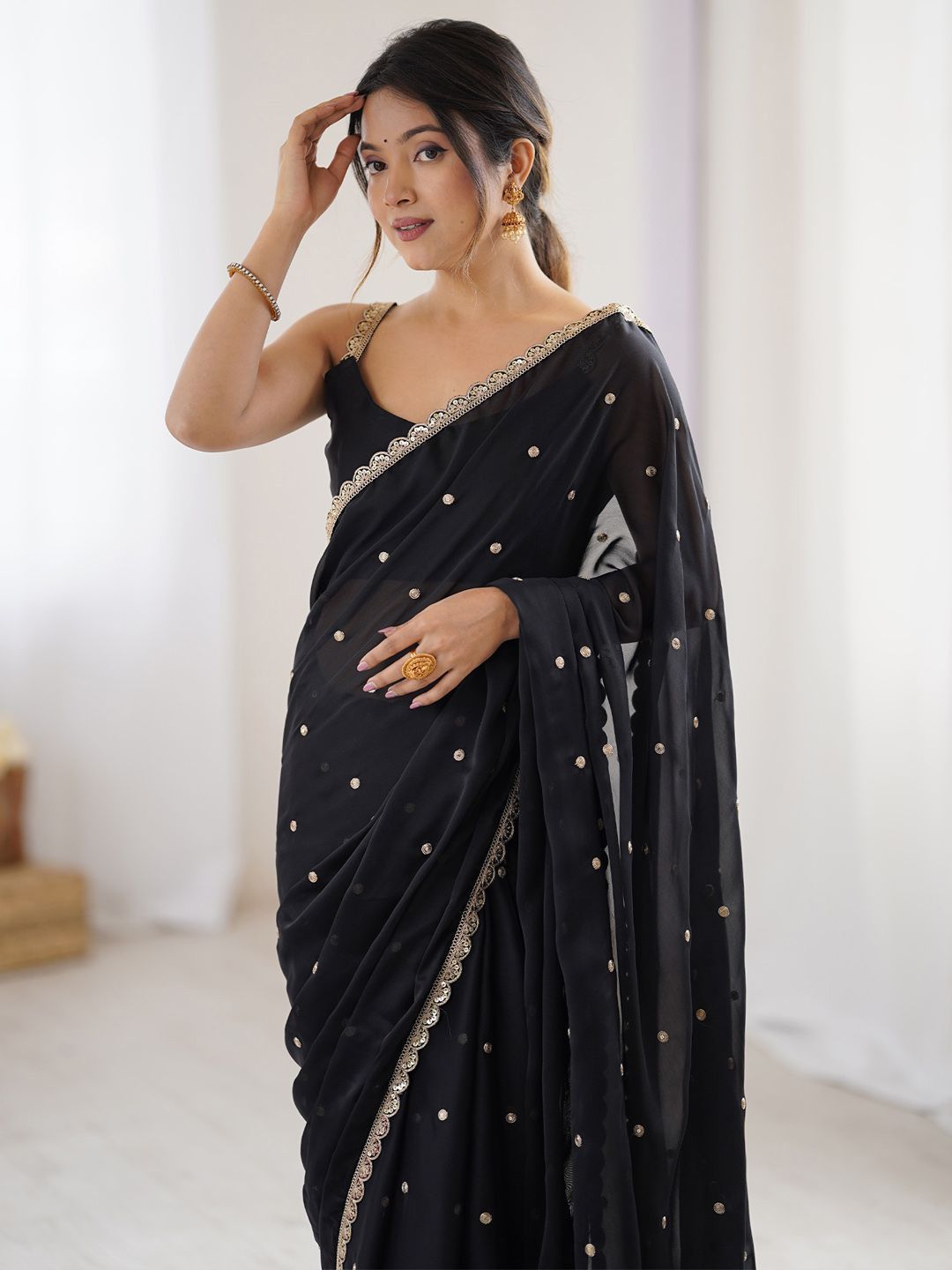 Royal Black Georgette Saree with Golden Zari Lace Border & Sequin Work – Elegant Party & Wedding Wear